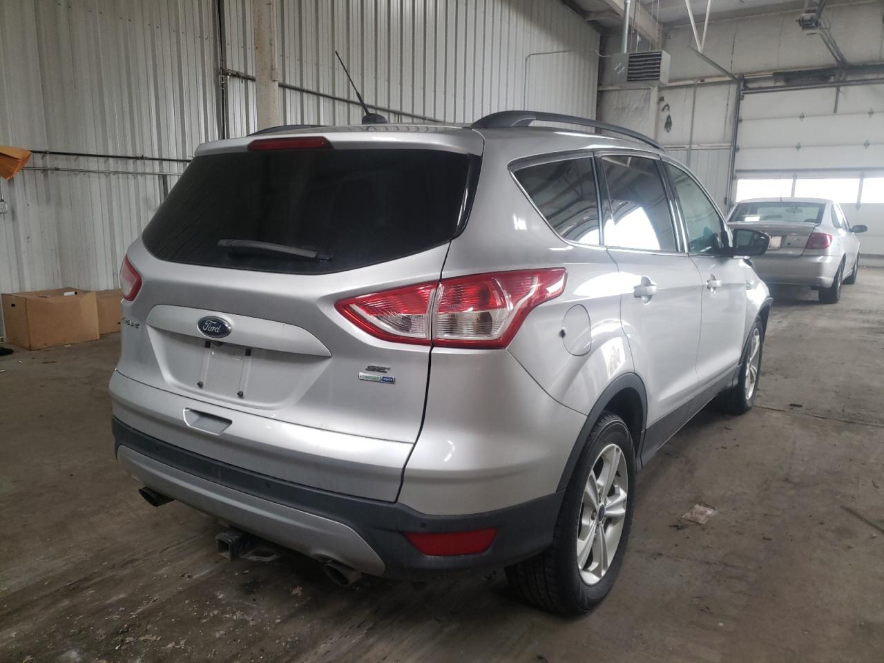 Photo 4 from auction – 2016 FORD ESCAPE SE with VIN 1FMCU9GX8GUA01467
