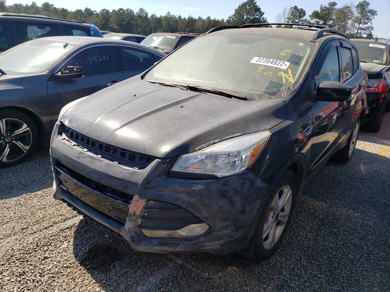 Photo 2 from auction – 2014 FORD ESCAPE SE with VIN 1FMCU9GX9EUB03731
