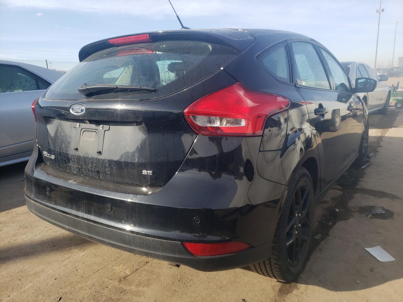Photo 4 from auction – 2016 FORD FOCUS SE with VIN 1FADP3K21GL330161