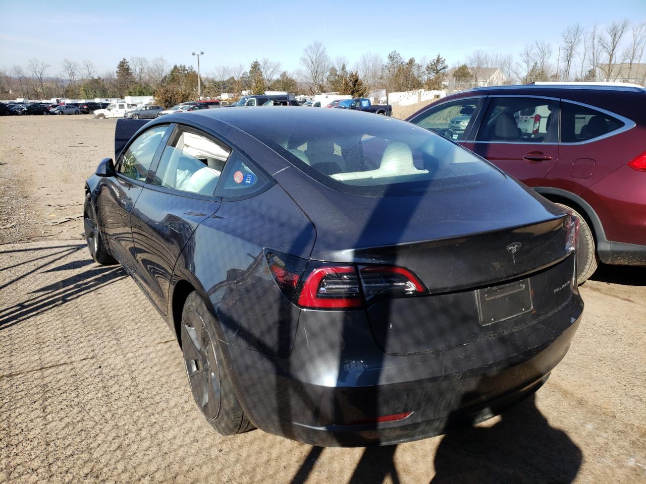 Photo 3 from auction – 2021 TESLA MODEL 3 with VIN 5YJ3E1EBXMF903083
