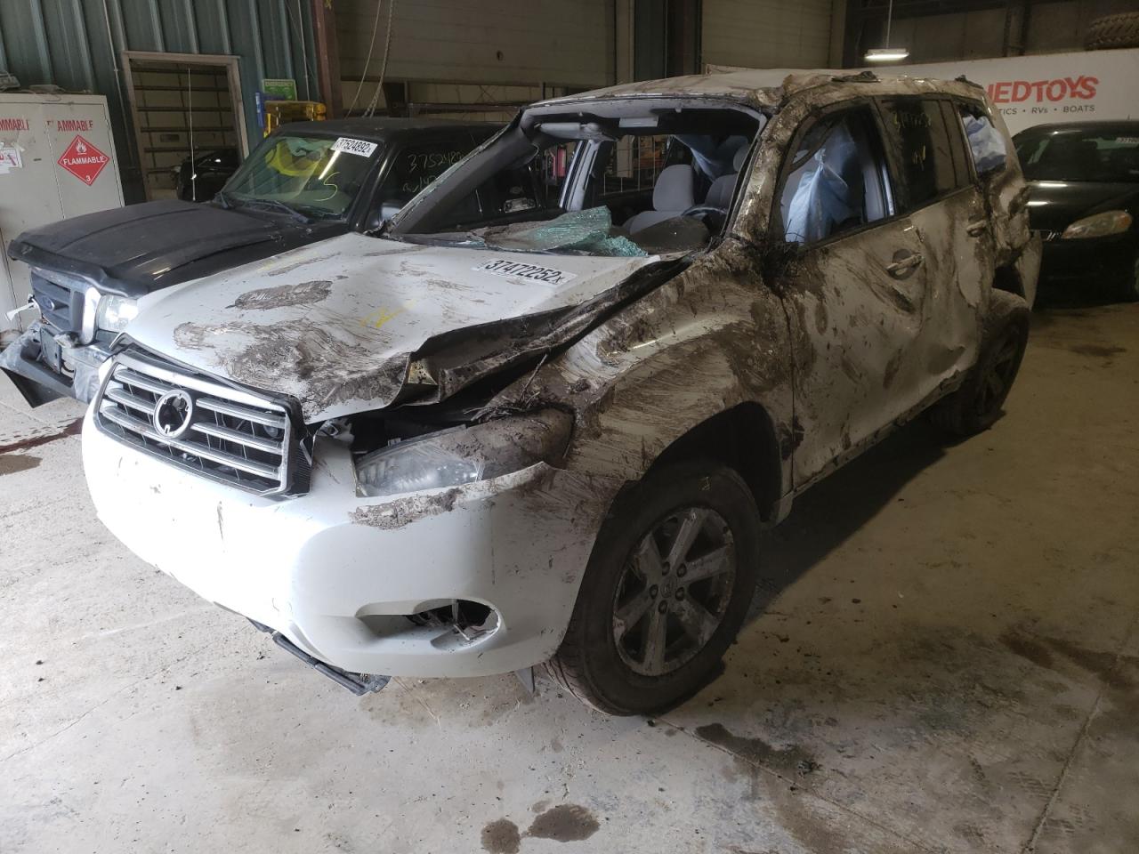 Photo 2 from auction – 2010 TOYOTA HIGHLANDER with VIN 5TDBK3EH6AS006306