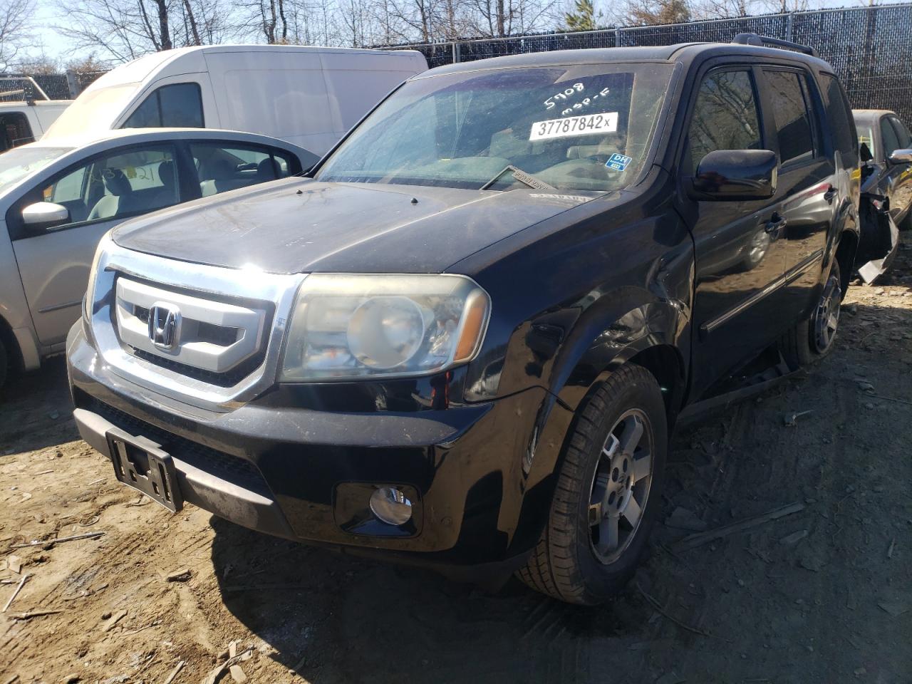Photo 2 from auction – 2011 HONDA PILOT TOUR with VIN 5FNYF4H98BB035708