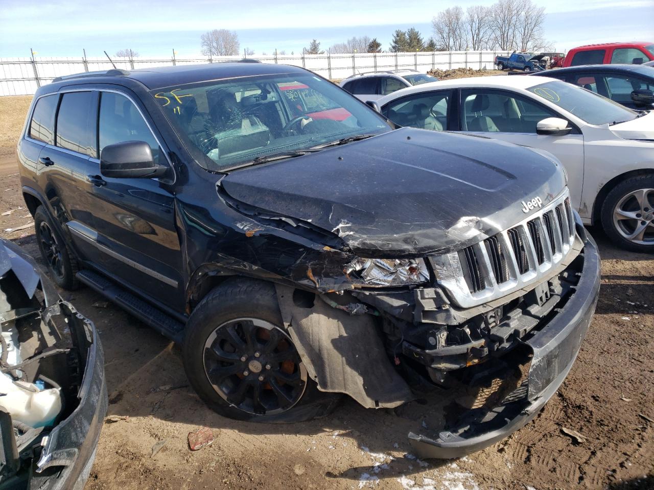 JEEP GRAND CHER 2011 with VIN 1J4RR4GG4BC581408 - Photo from auction