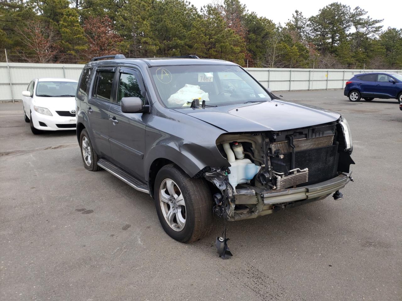 HONDA PILOT EXL 2012 with VIN 5FNYF4H51CB042286 - Photo from auction