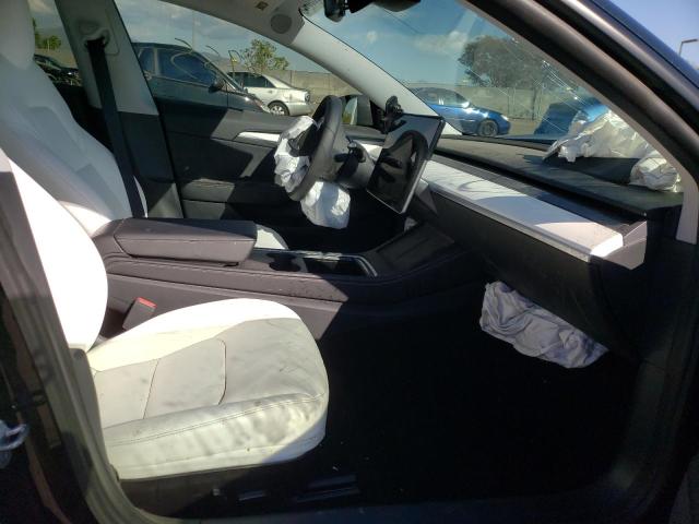 Photo 5 from auction – 2021 TESLA MODEL 3 with VIN 5YJ3E1EA3MF050162