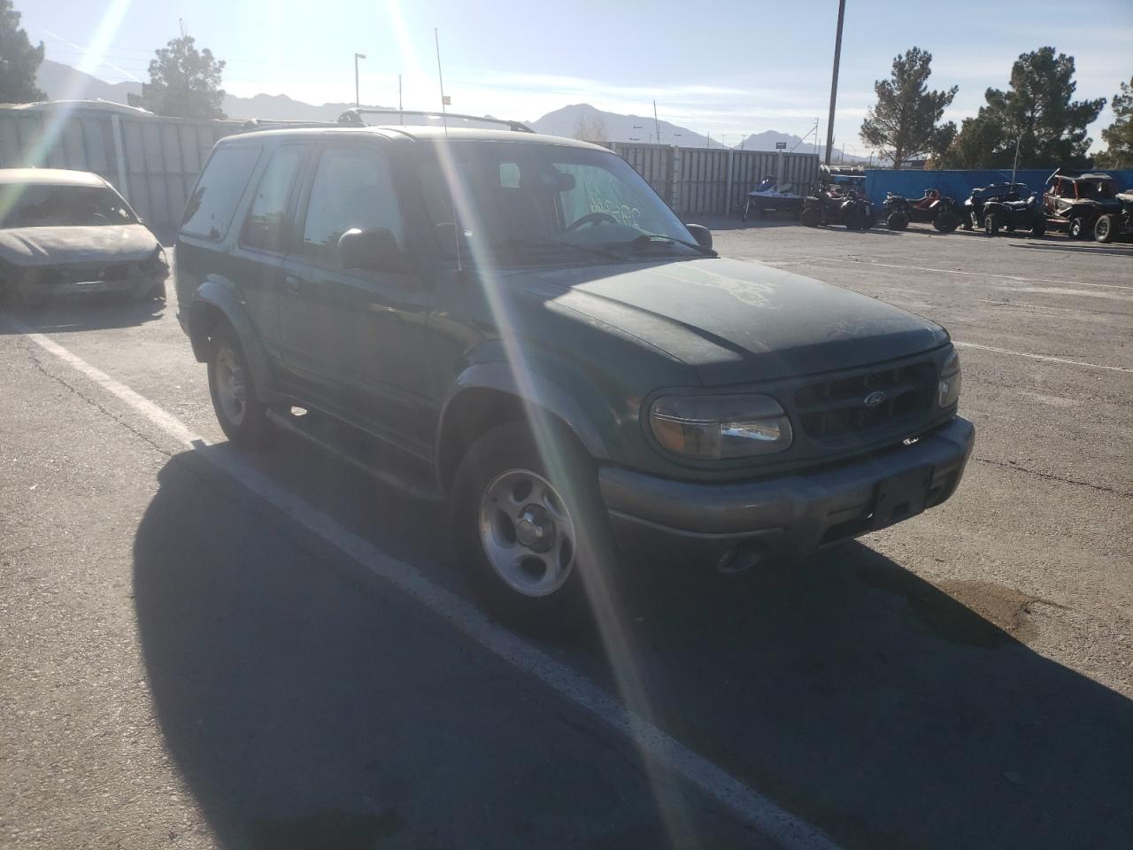 FORD EXPLORER 1999 with VIN 1FMYU24EXXUB30097 - Photo from auction