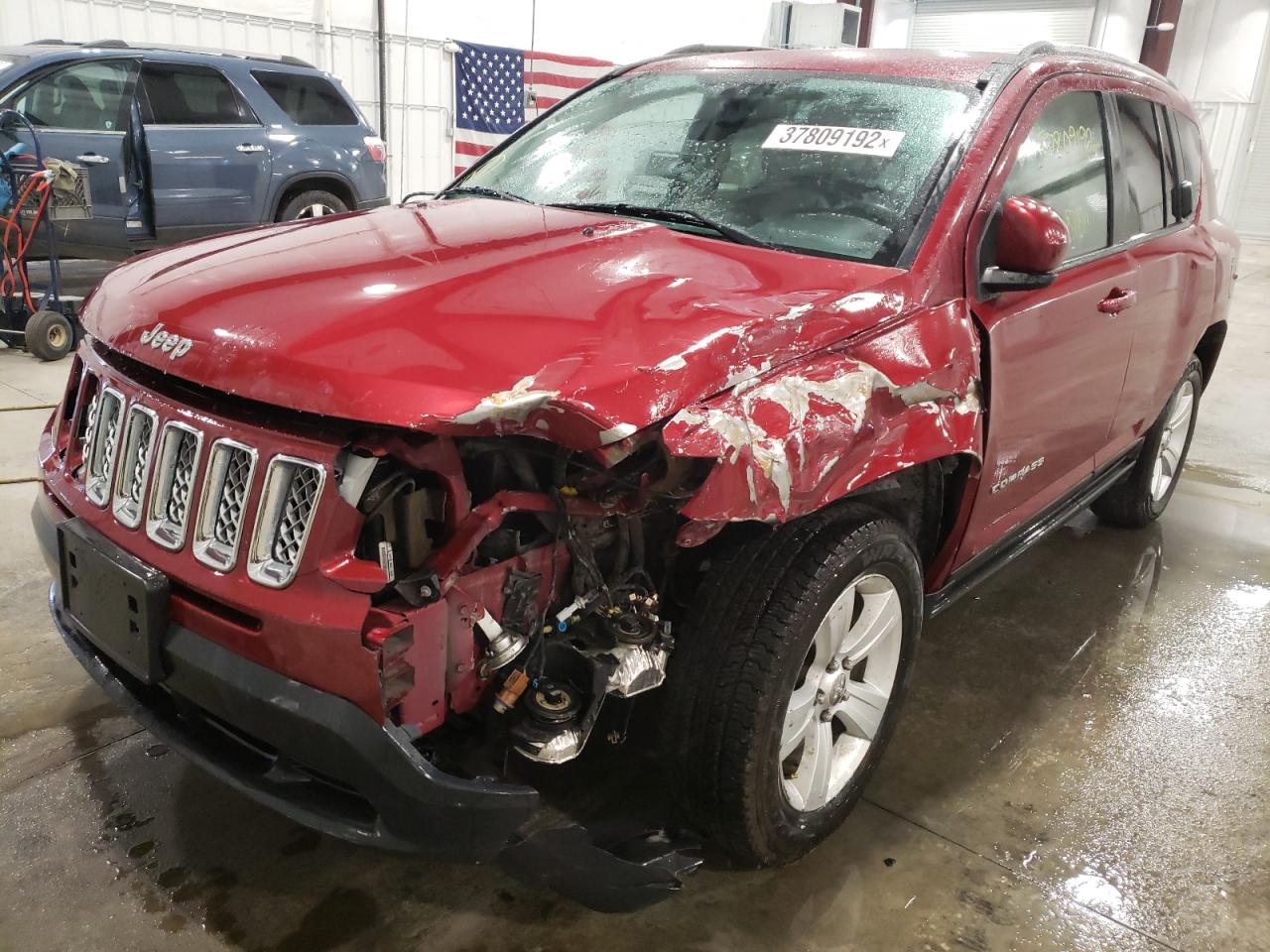 Photo 2 from auction – 2014 JEEP COMPASS LA with VIN 1C4NJDEB1ED617542