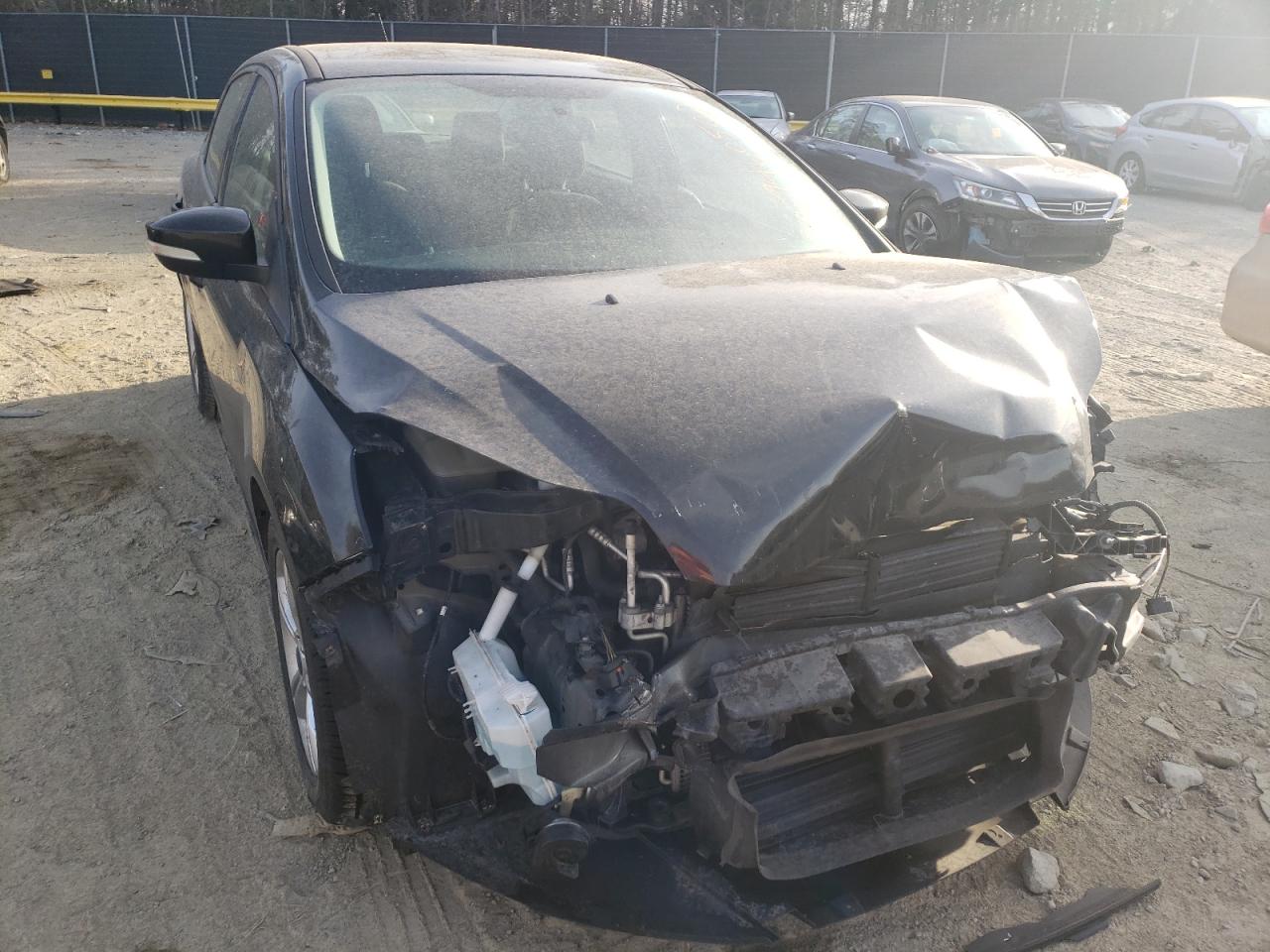 Foto 9 de la subasta – 2014 FORD FOCUS SE con VIN 1FADP3F21EL387841