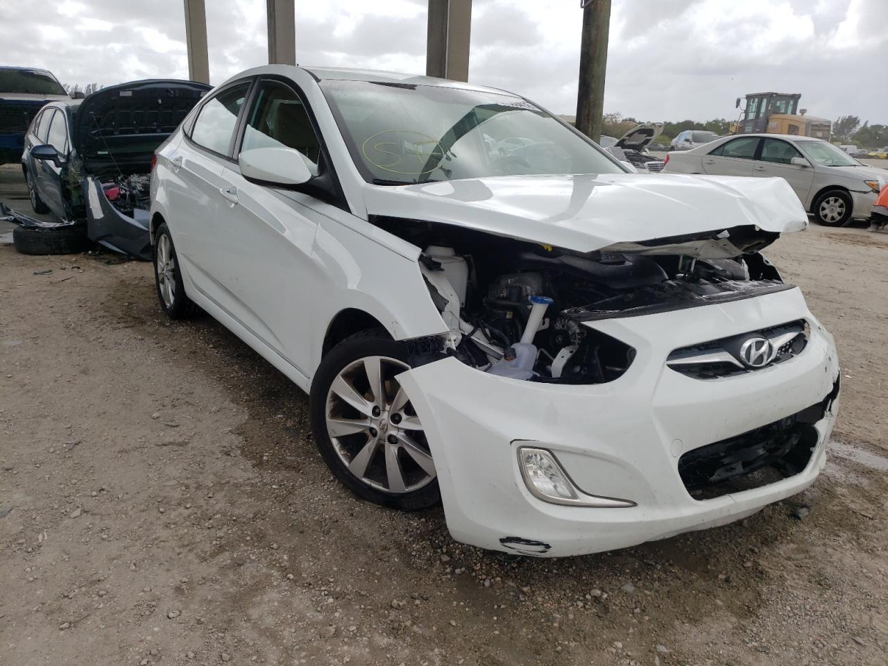 HYUNDAI ACCENT GLS 2014 with VIN KMHCU4AE8EU764693 - Photo from auction