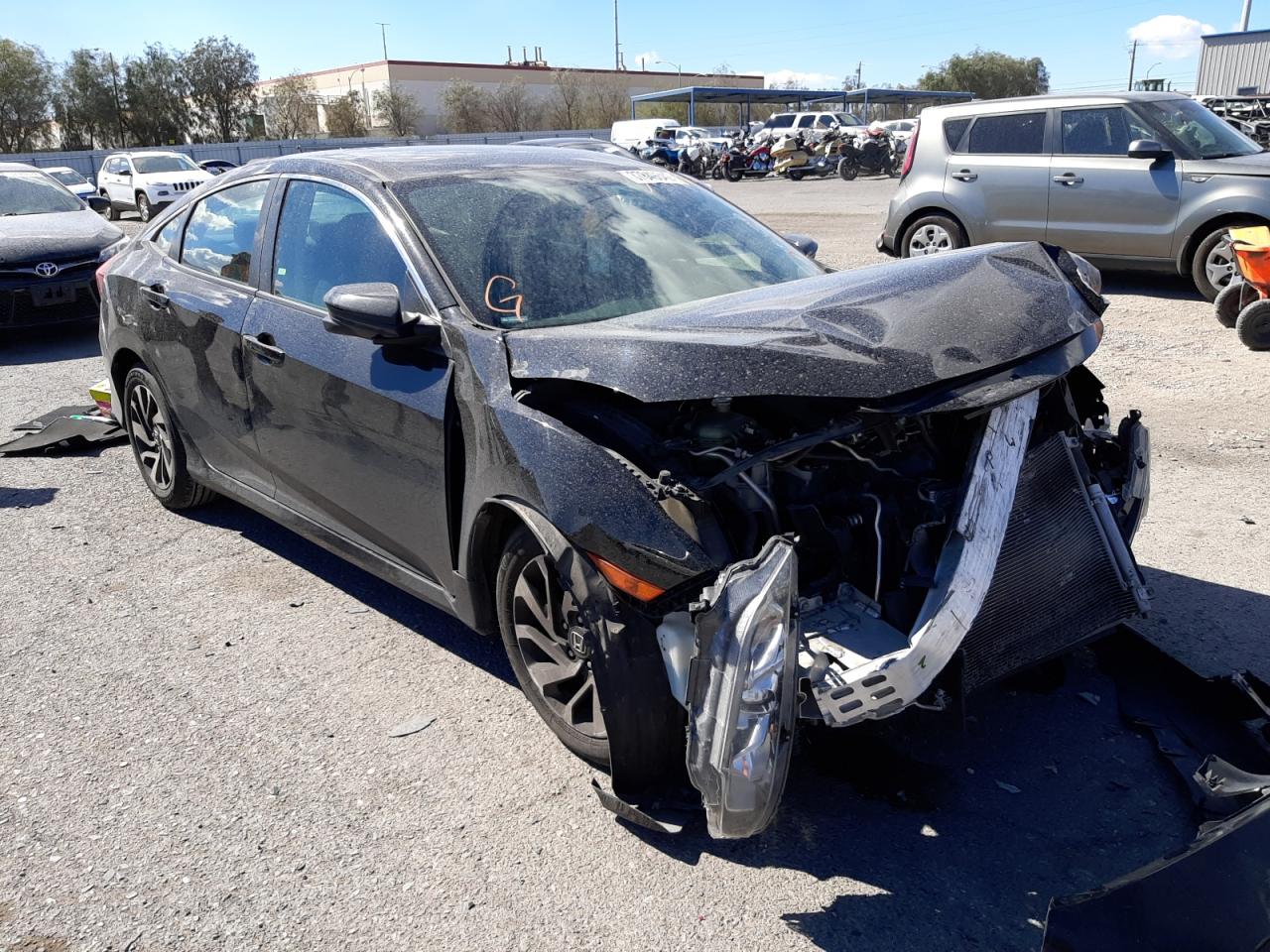 HONDA CIVIC EX 2017 with VIN 19XFC2F79HE019182 - Photo from auction