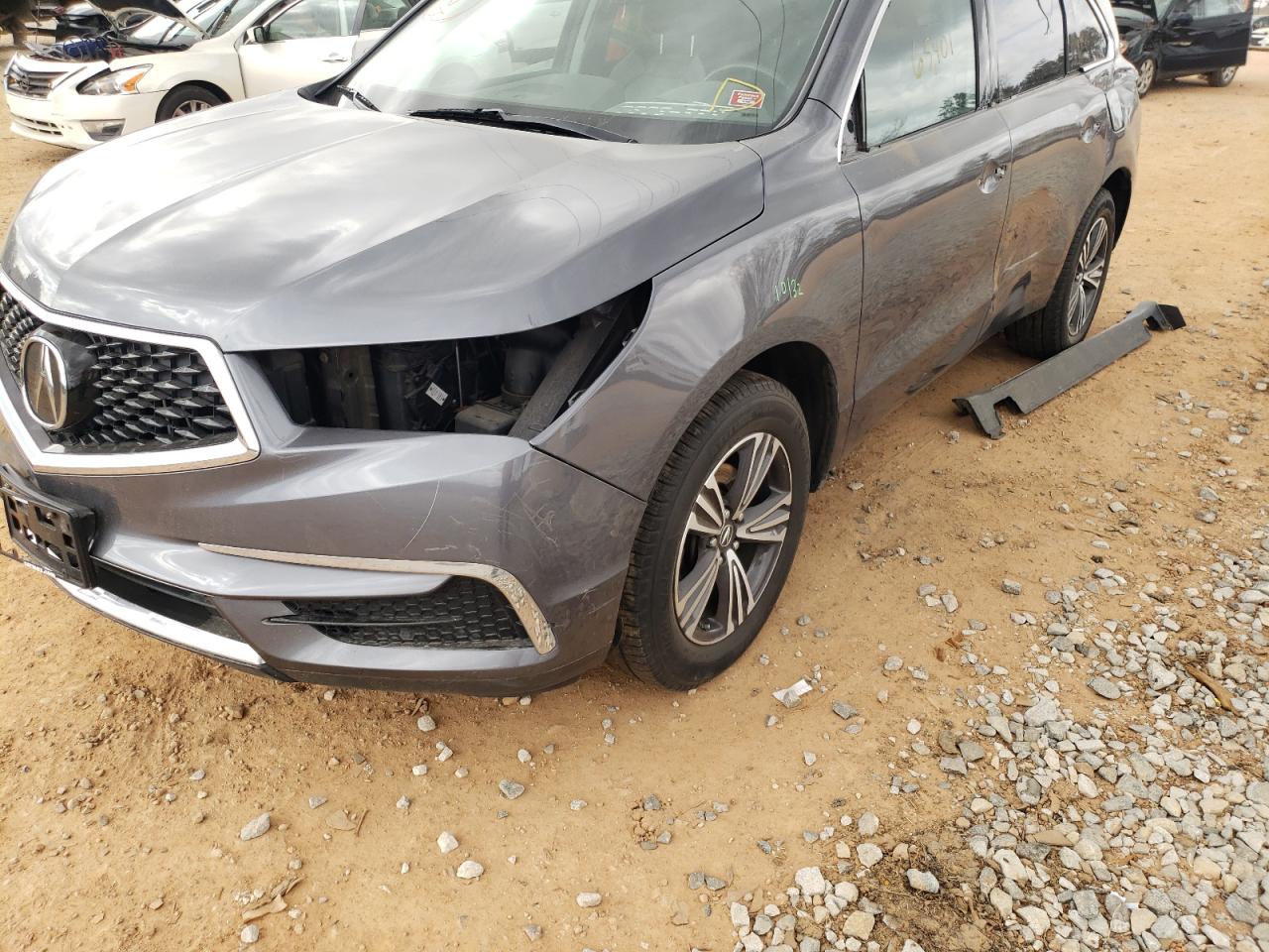 Photo 9 from auction – 2017 ACURA MDX with VIN 5FRYD4H34HB008224