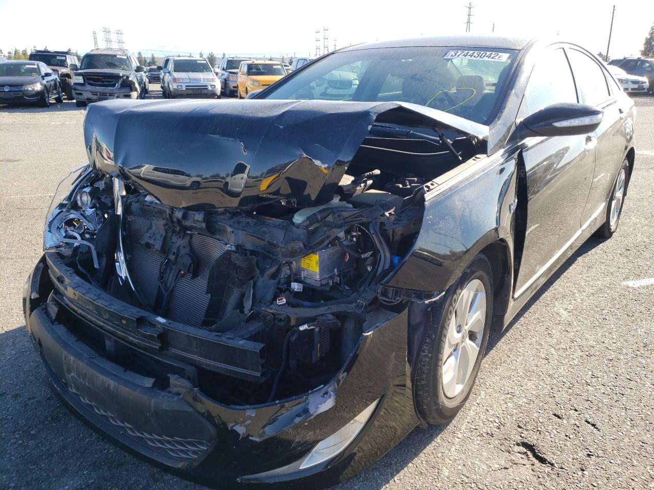 Photo 2 from auction – 2015 HYUNDAI SONATA HYB with VIN KMHEC4A48FA137529
