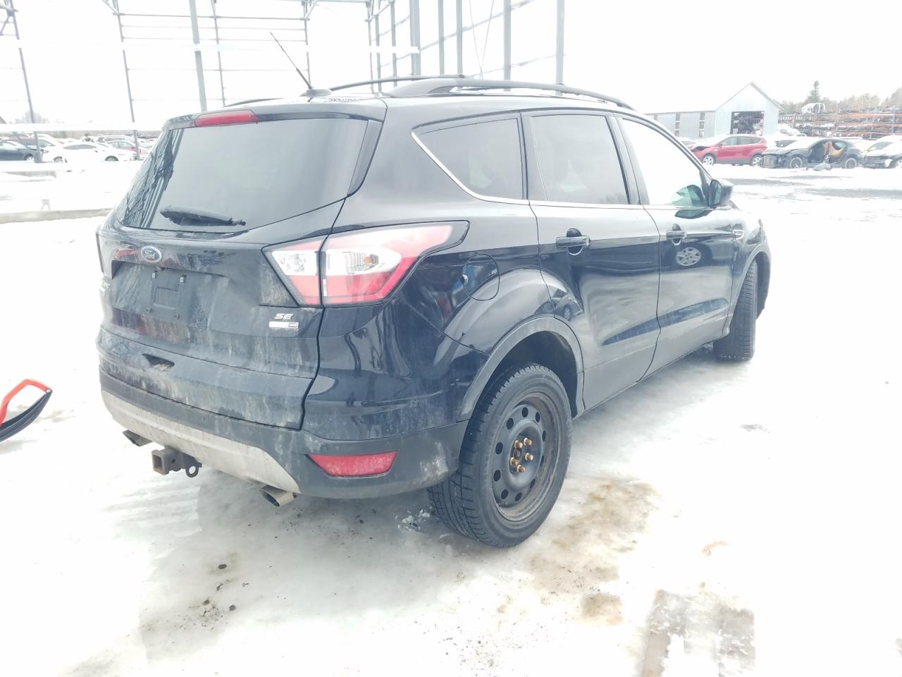 Photo 4 from auction – 2017 FORD ESCAPE SE with VIN 1FMCU9G91HUD13438