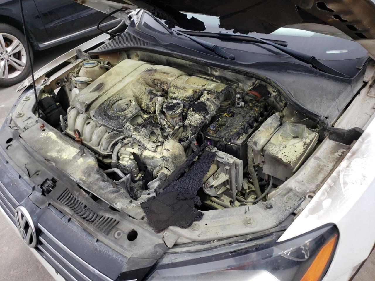 Photo 9 from auction – 2012 VOLKSWAGEN PASSAT with VIN 1VWBH7A34CC076713