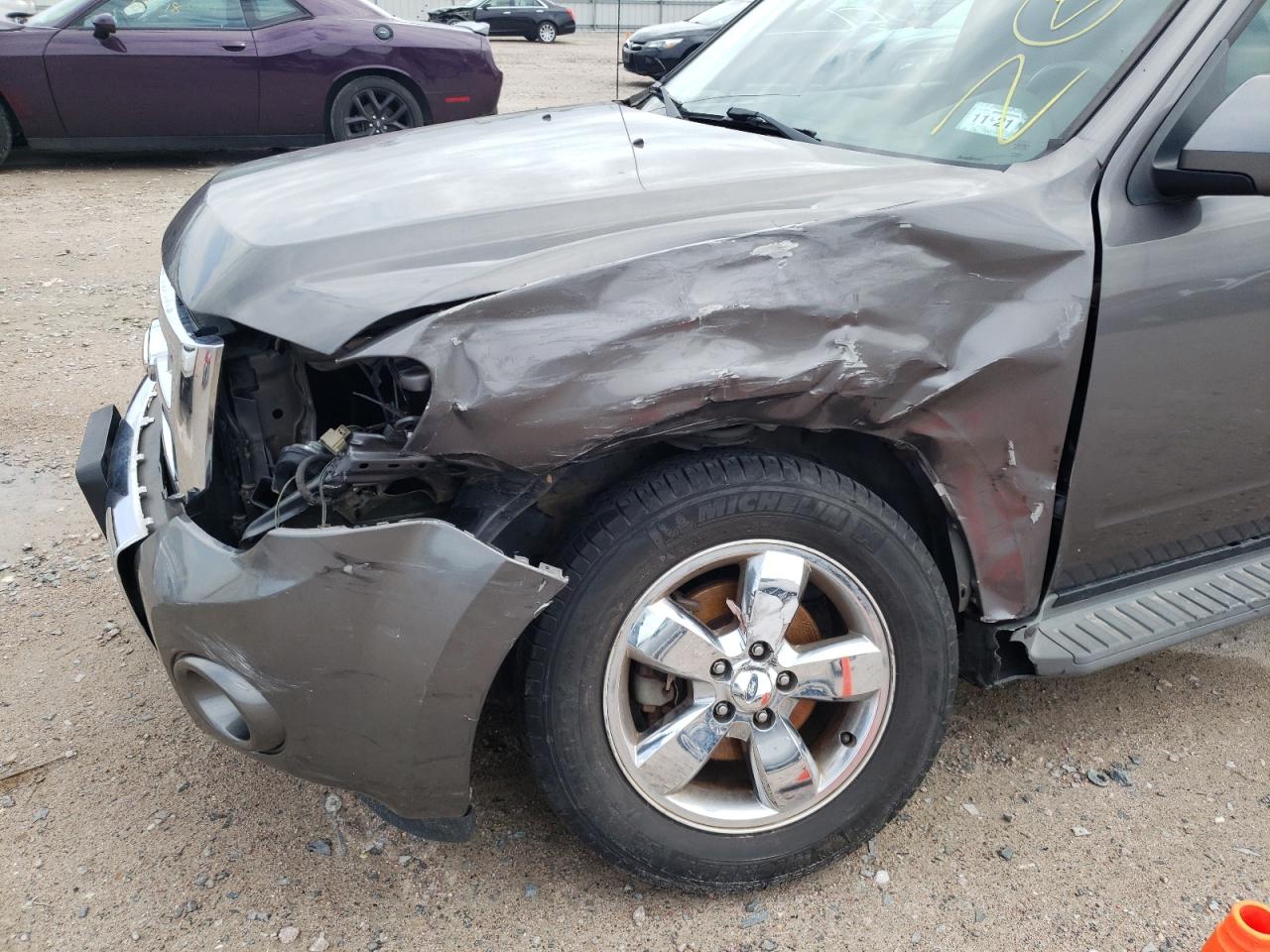 Photo 9 from auction – 2012 FORD ESCAPE LIM with VIN 1FMCU0EG0CKB53439