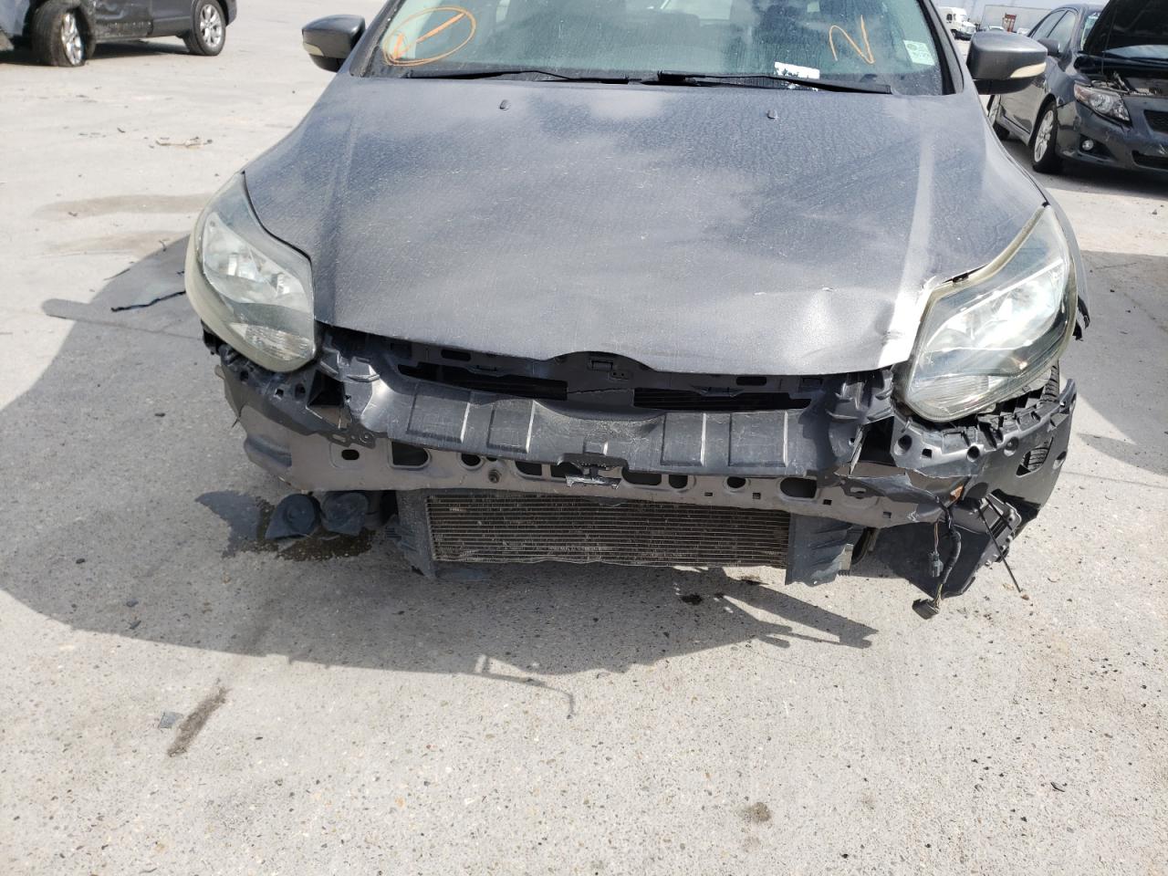 Photo 9 from auction – 2013 FORD FOCUS SE with VIN 1FADP3K28DL297400