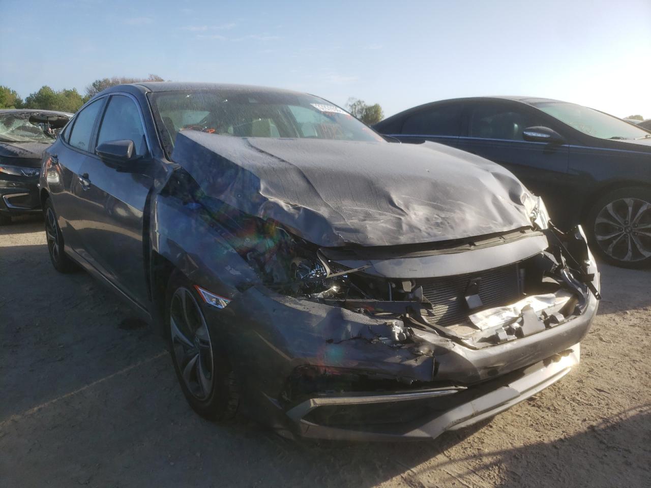 HONDA CIVIC LX 2019 with VIN 19XFC2F63KE044092 - Photo from auction