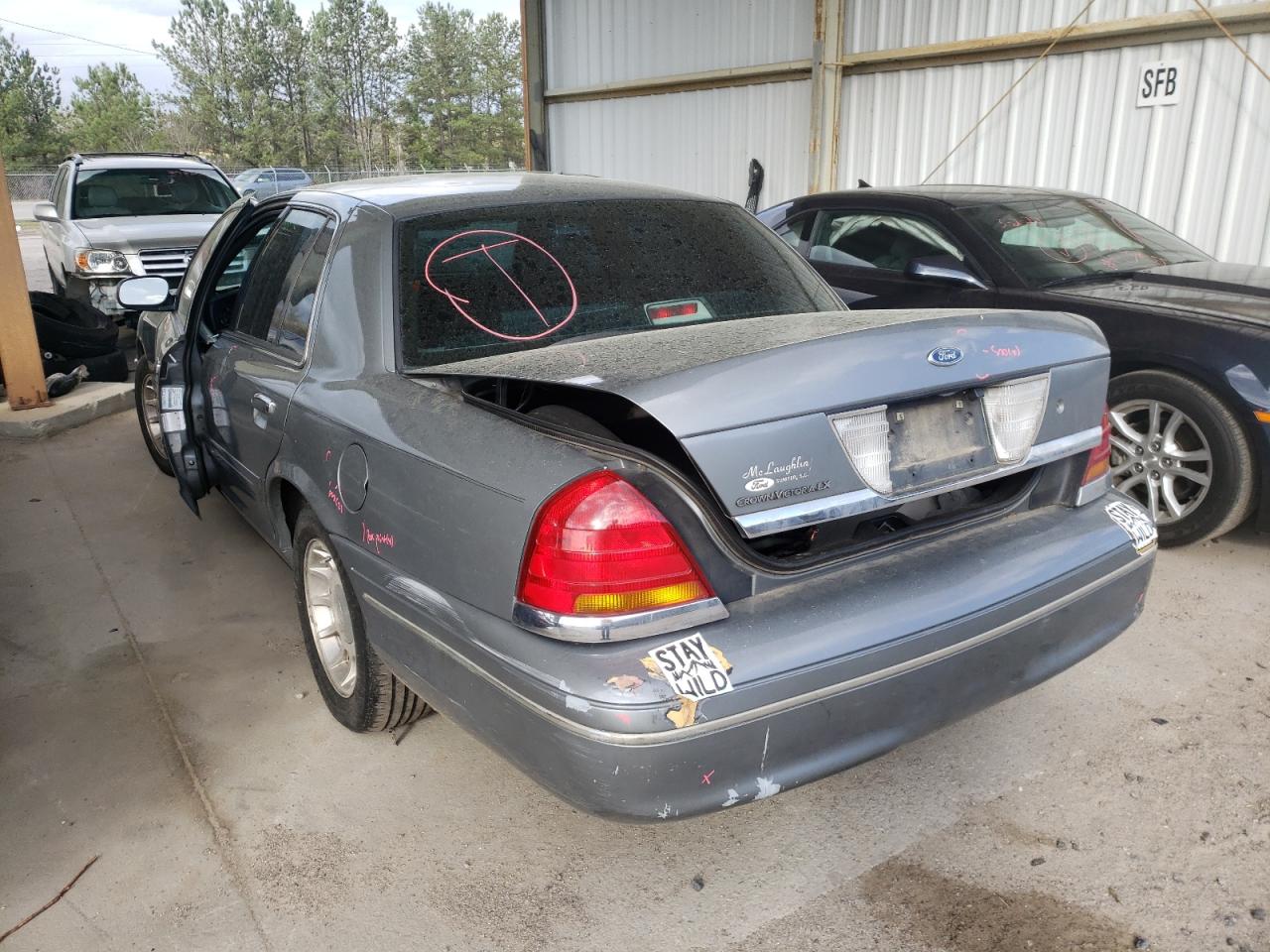 Photo 3 from auction – 1999 FORD CROWN VICT with VIN 2FAFP74W0XX229289