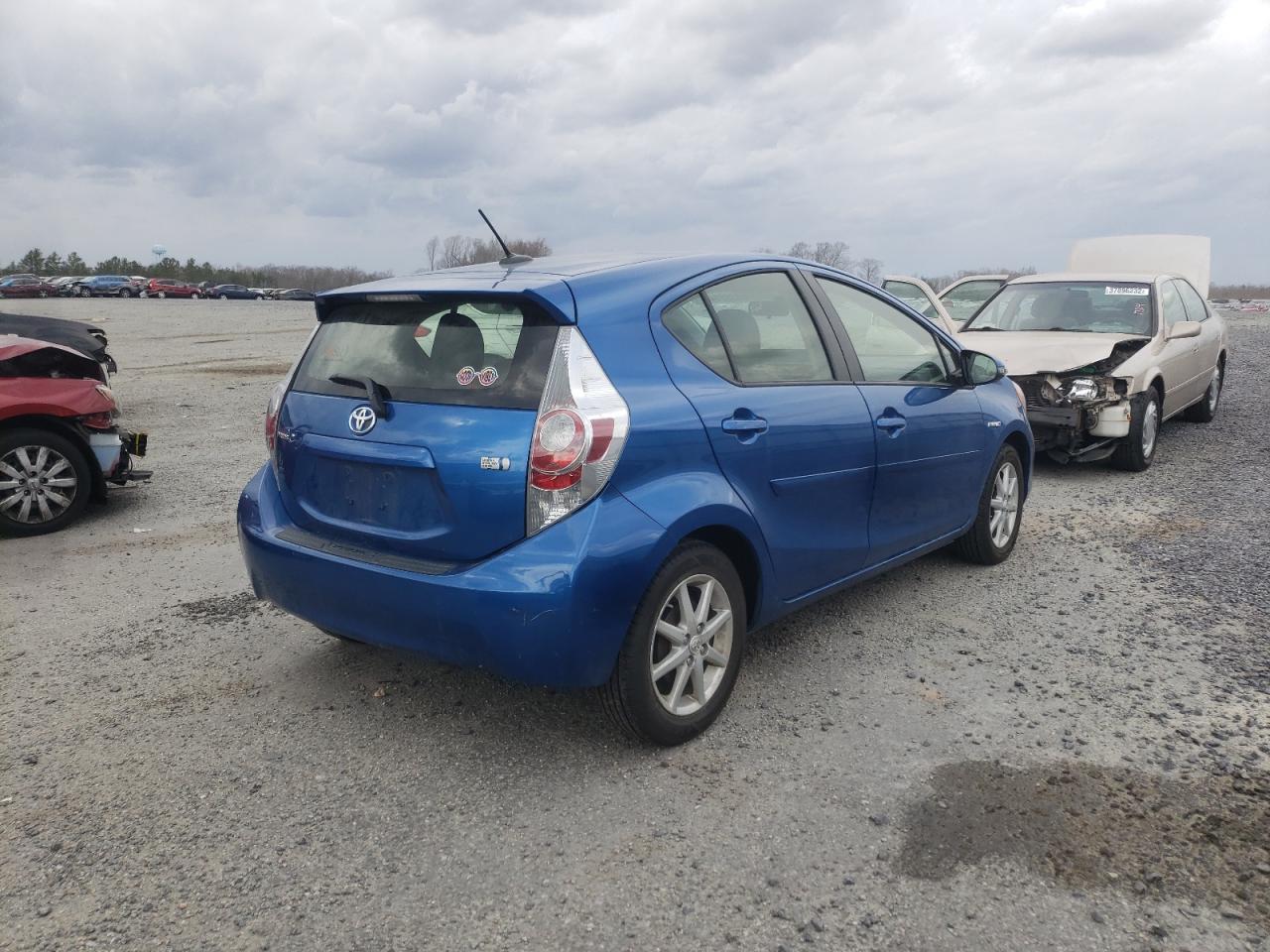 Photo 4 from auction – 2014 TOYOTA PRIUS C with VIN JTDKDTB31E1071490