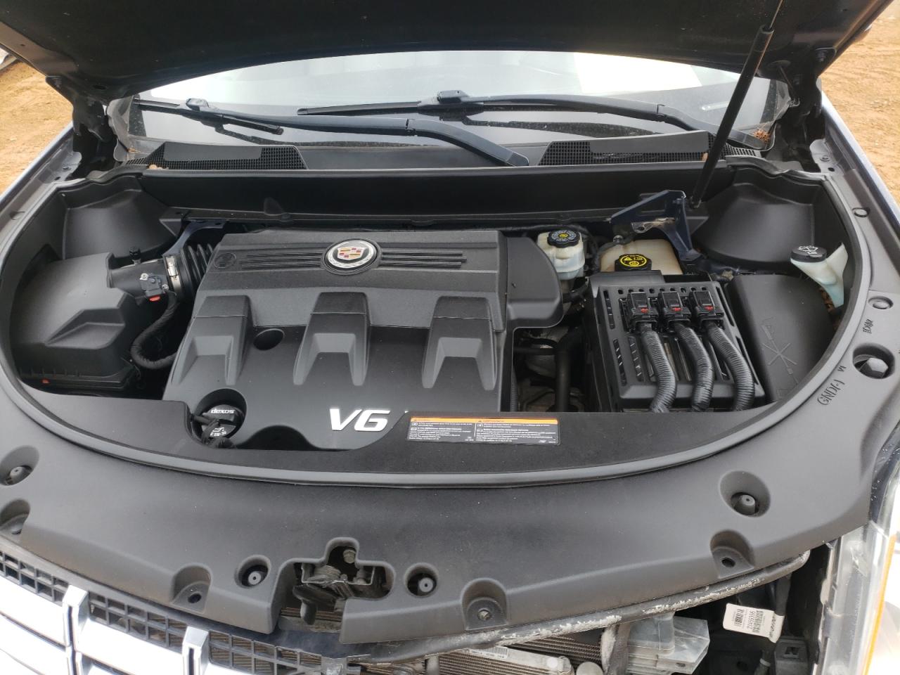 Photo 7 from auction – 2015 CADILLAC SRX with VIN 3GYFNAE31FS524564