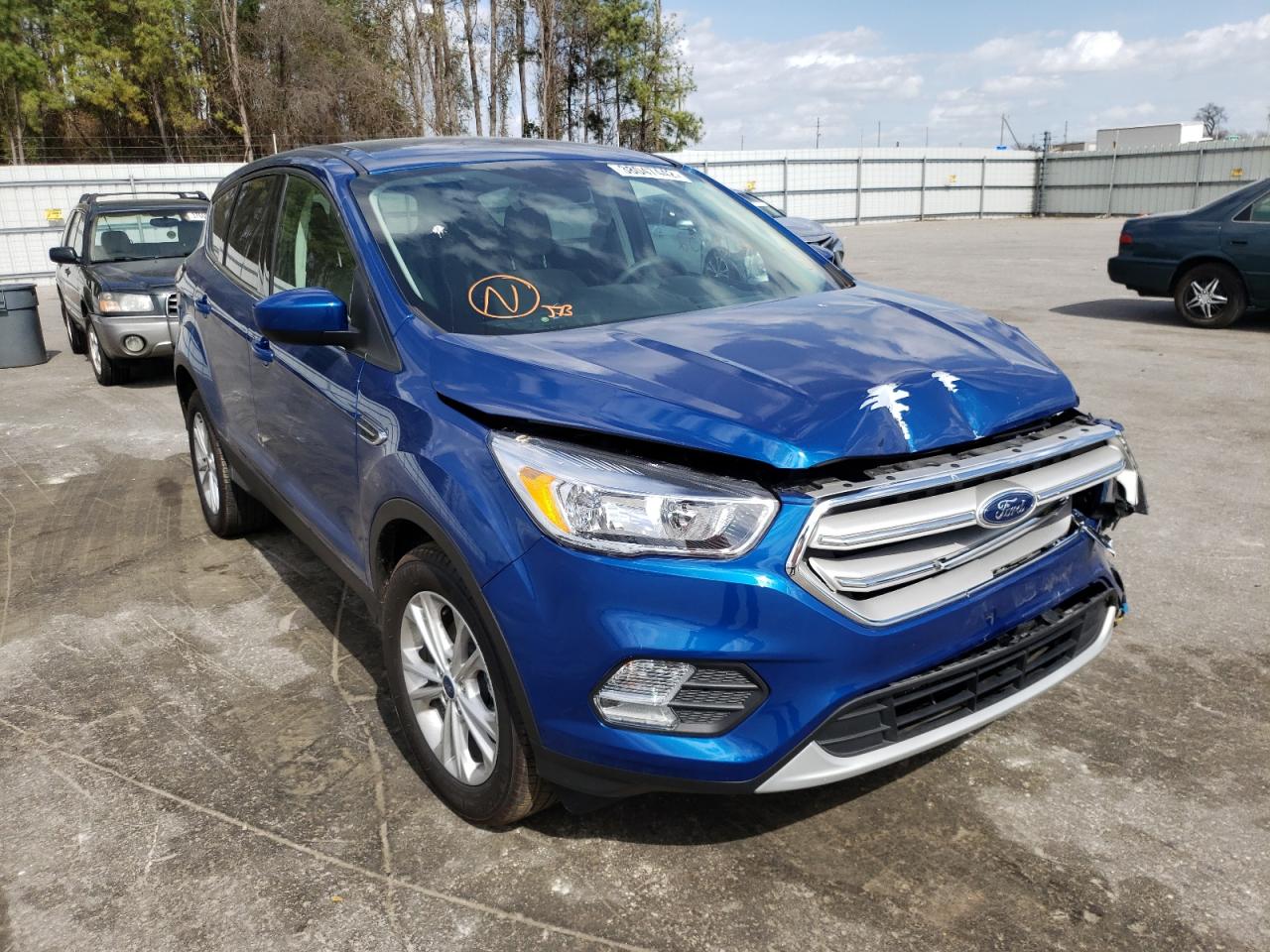 FORD ESCAPE SE 2019 with VIN 1FMCU0GD3KUC19651 - Photo from auction