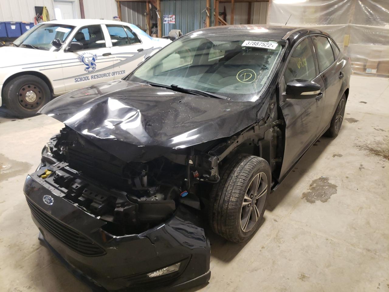 Photo 2 from auction – 2018 FORD FOCUS SE with VIN 1FADP3F26JL241011