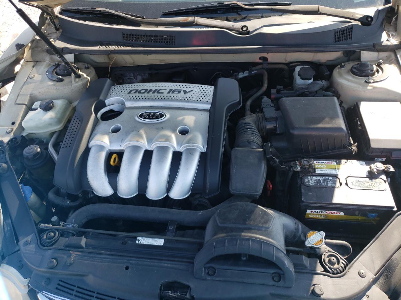 Photo 7 from auction – 2006 KIA OPTIMA LX with VIN KNAGE123365056049