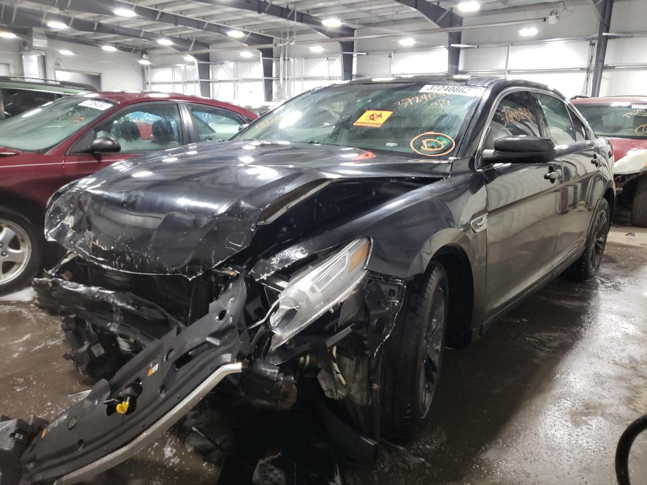 Photo 2 from auction – 2014 FORD TAURUS SEL with VIN 1FAHP2E80EG131880