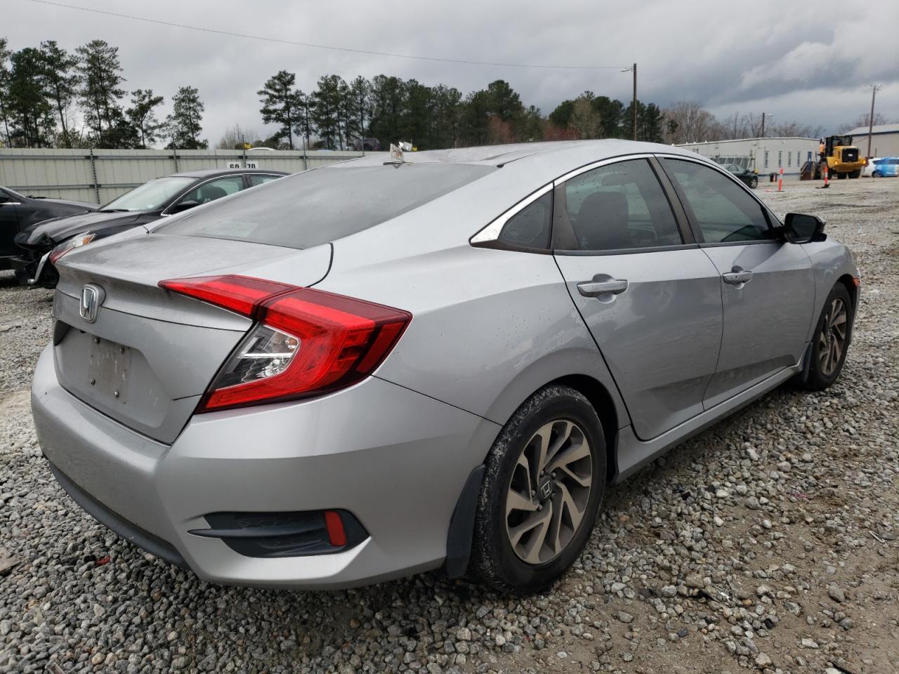 Photo 4 from auction – 2017 HONDA CIVIC EX with VIN 19XFC2F74HE056169