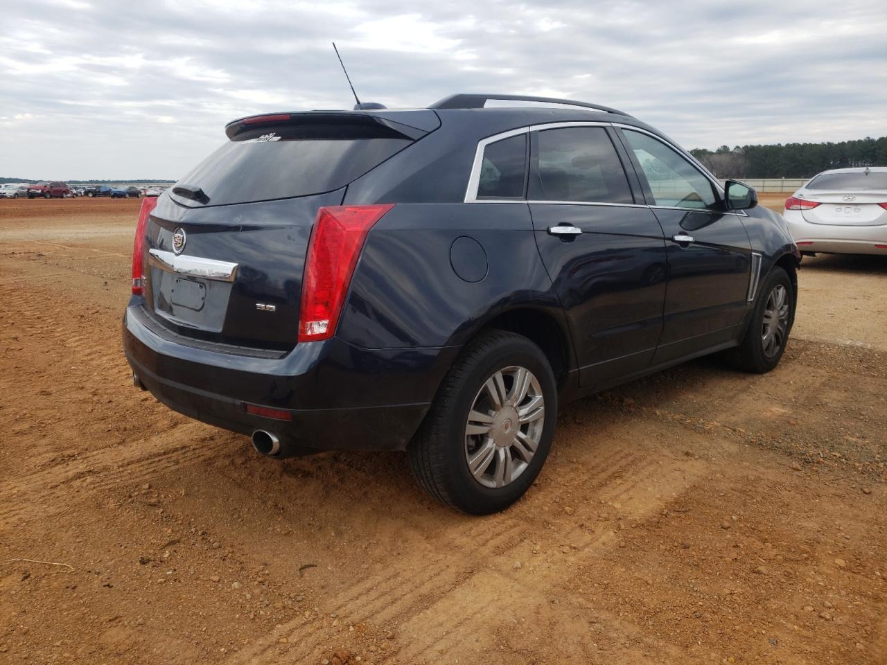Photo 4 from auction – 2015 CADILLAC SRX with VIN 3GYFNAE31FS524564