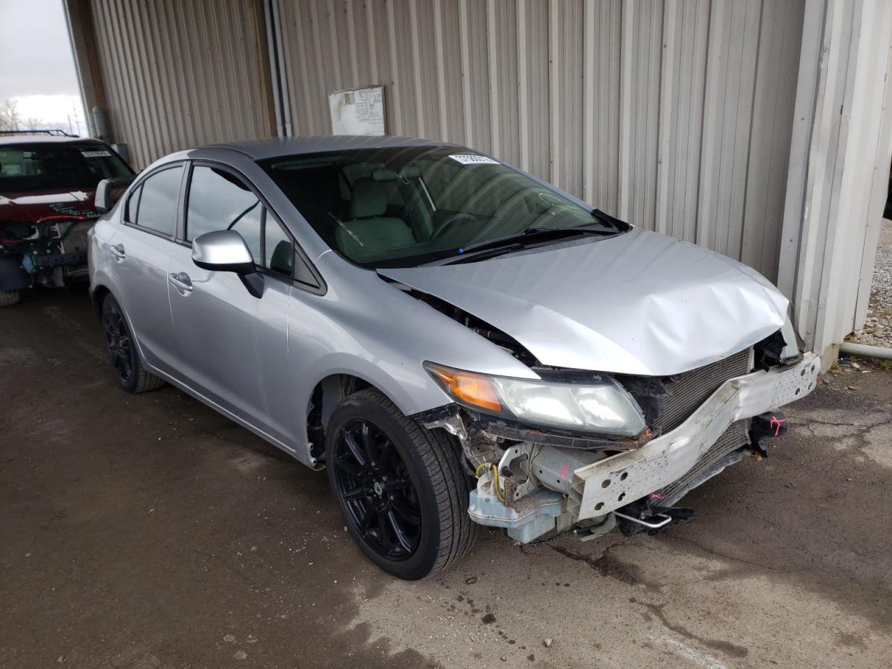 HONDA CIVIC LX 2012 with VIN 2HGFB2F59CH303041 - Photo from auction
