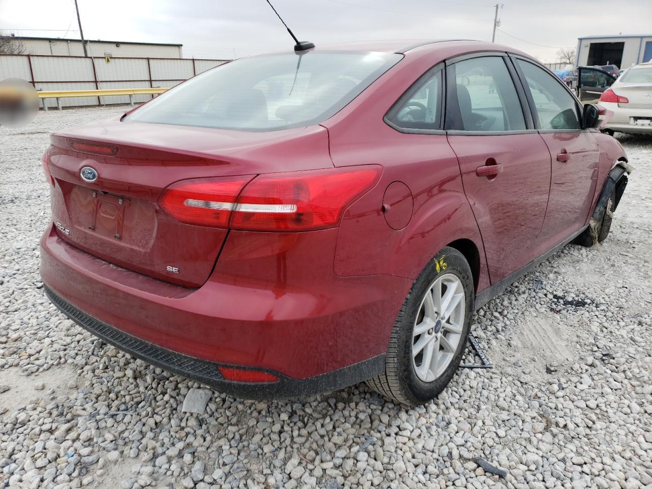 Photo 4 from auction – 2017 FORD FOCUS SE with VIN 1FADP3F24HL244743