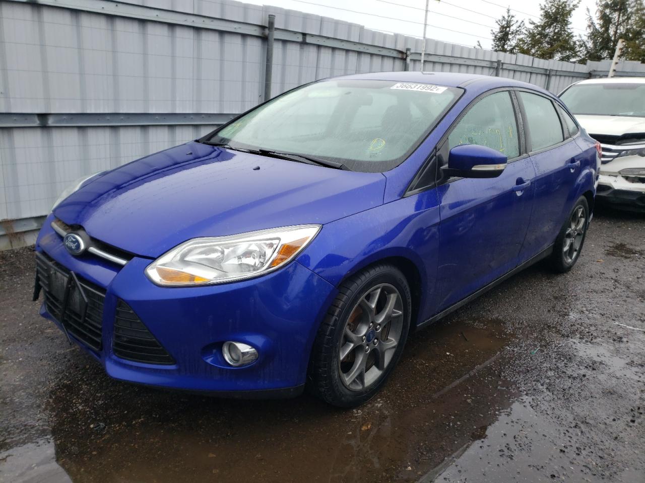 Photo 2 from auction – 2014 FORD FOCUS SE with VIN 1FADP3F28EL365254