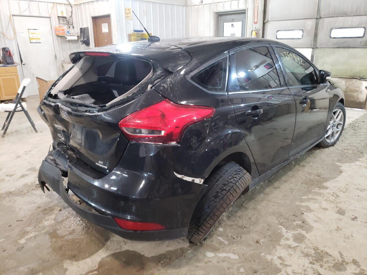Photo 4 from auction – 2015 FORD FOCUS SE with VIN 1FADP3K24FL261416
