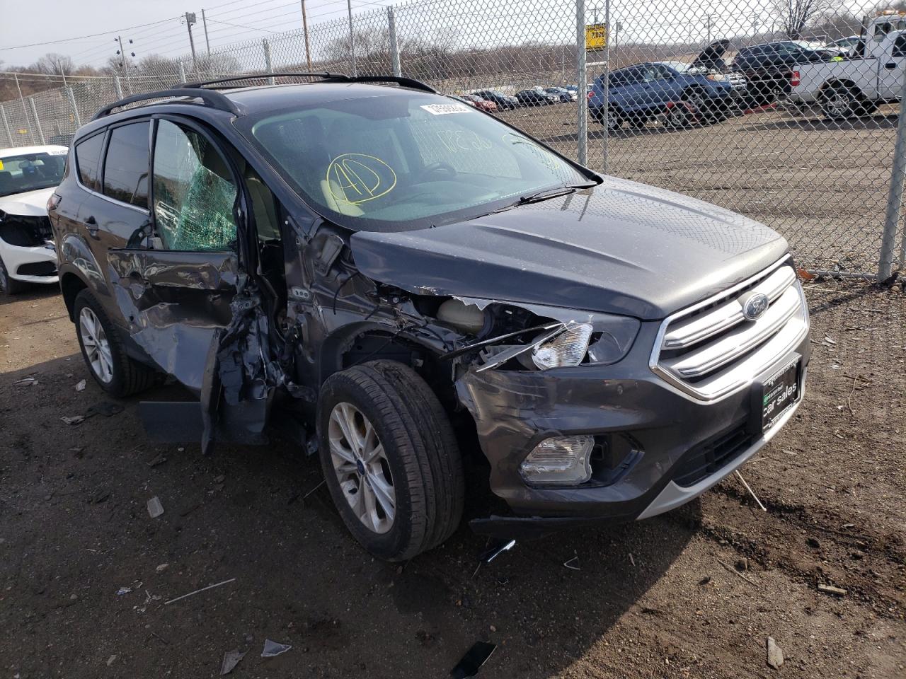 FORD ESCAPE SE 2018 with VIN 1FMCU0GD5JUC77422 - Photo from auction