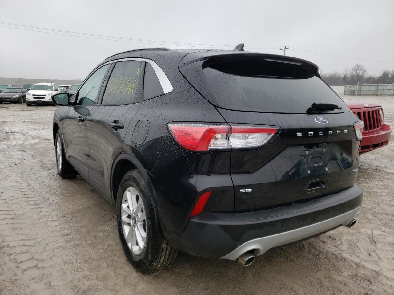 Photo 3 from auction – 2021 FORD ESCAPE SE with VIN 1FMCU9G67MUA30929