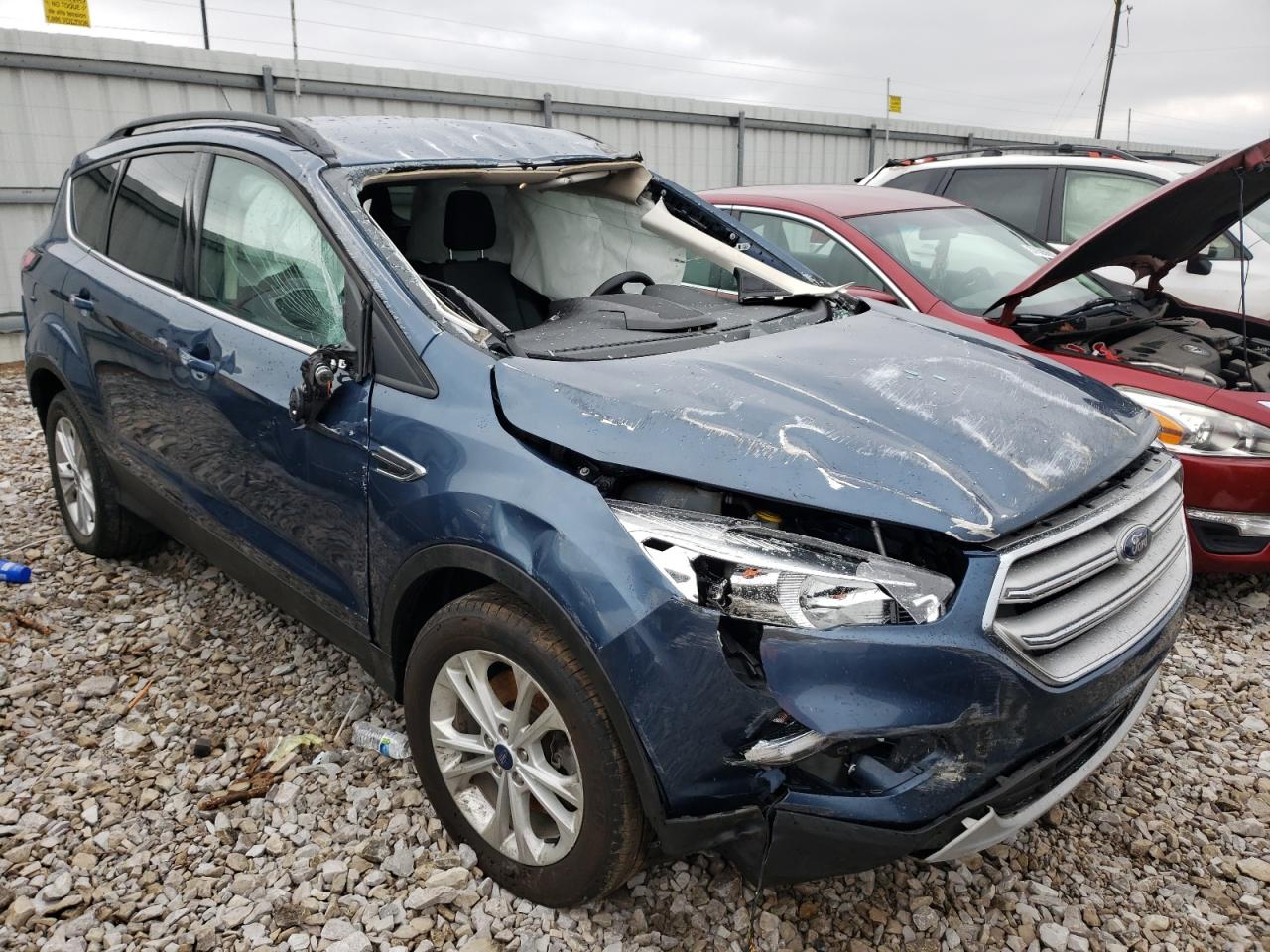 FORD ESCAPE SE 2018 with VIN 1FMCU9GD9JUB53951 - Photo from auction
