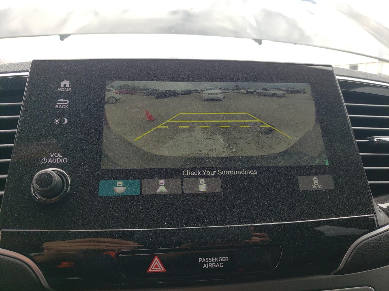 Photo 9 from auction – 2021 HONDA PASSPORT E with VIN 5FNYF7H53MB010586