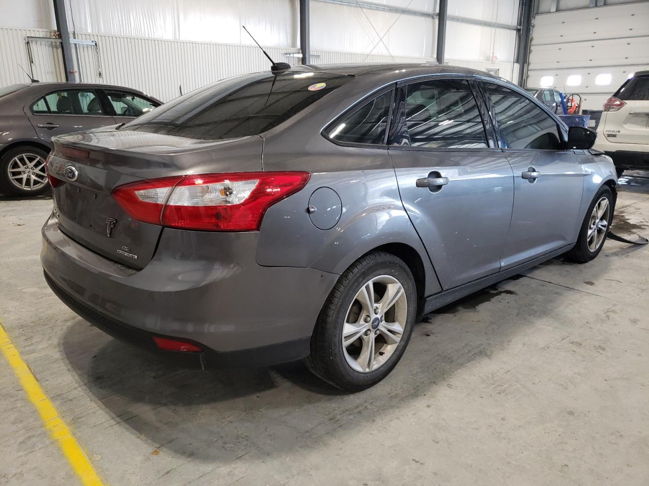 Photo 4 from auction – 2014 FORD FOCUS SE with VIN 1FADP3F22EL413203