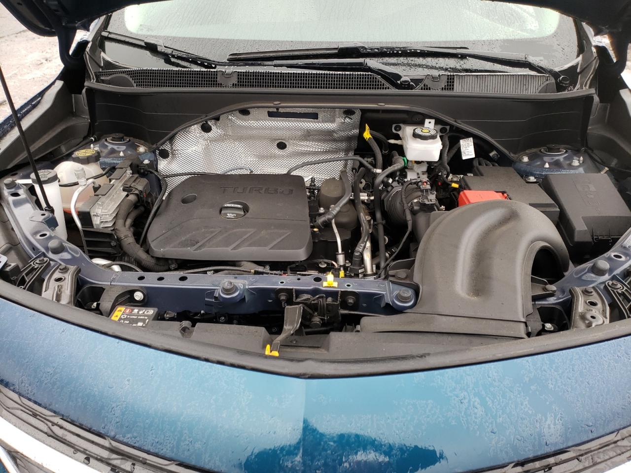 Photo 7 from auction – 2021 BUICK ENCORE GX with VIN KL4MMCSL1MB084347
