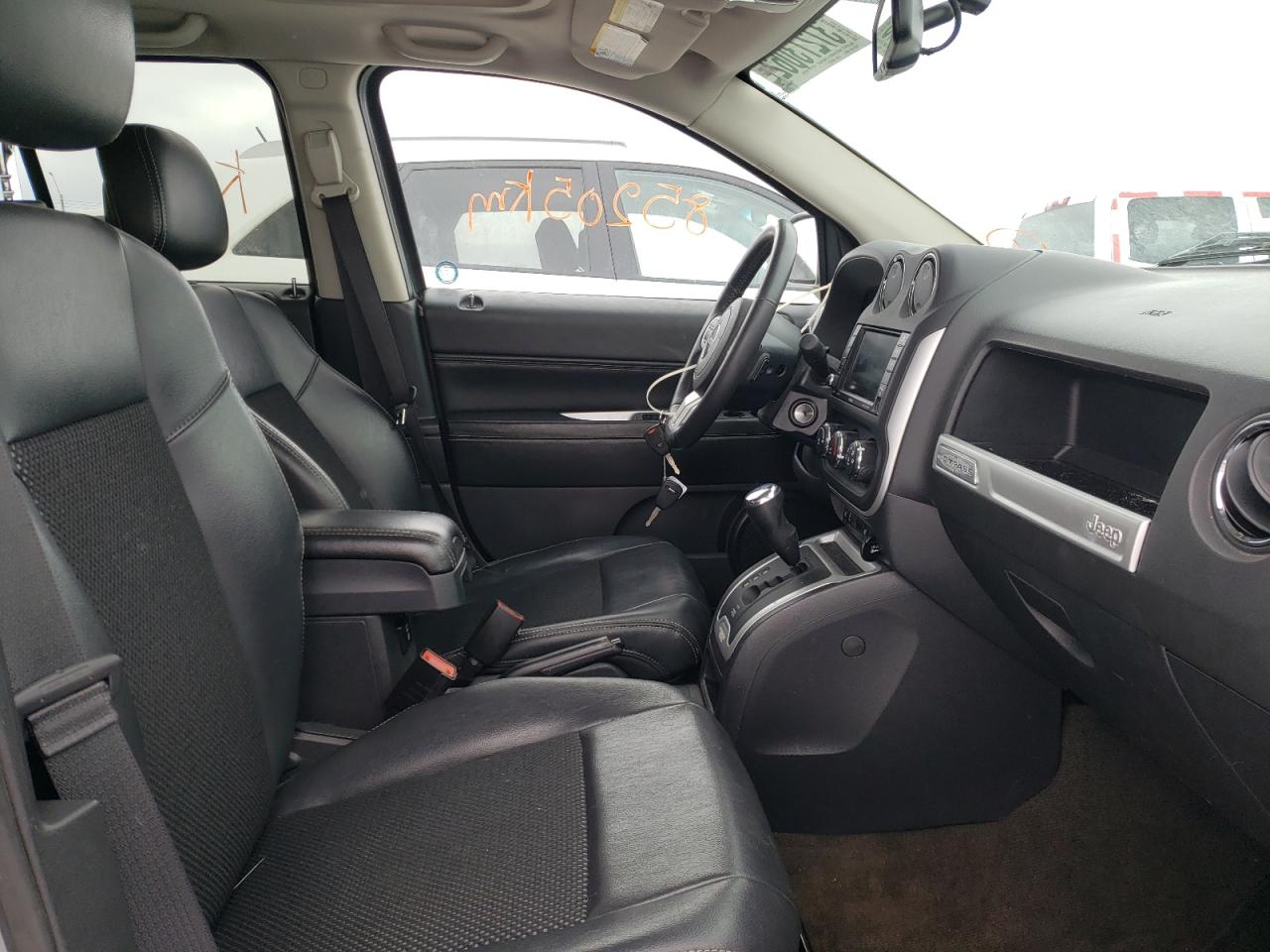 Photo 5 from auction – 2014 JEEP COMPASS SP with VIN 1C4NJDABXED748541