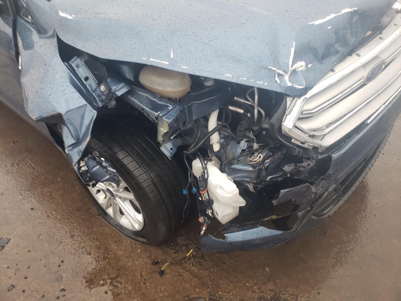 Photo 9 from auction – 2018 FORD ESCAPE SE with VIN 1FMCU9GD2JUB41334