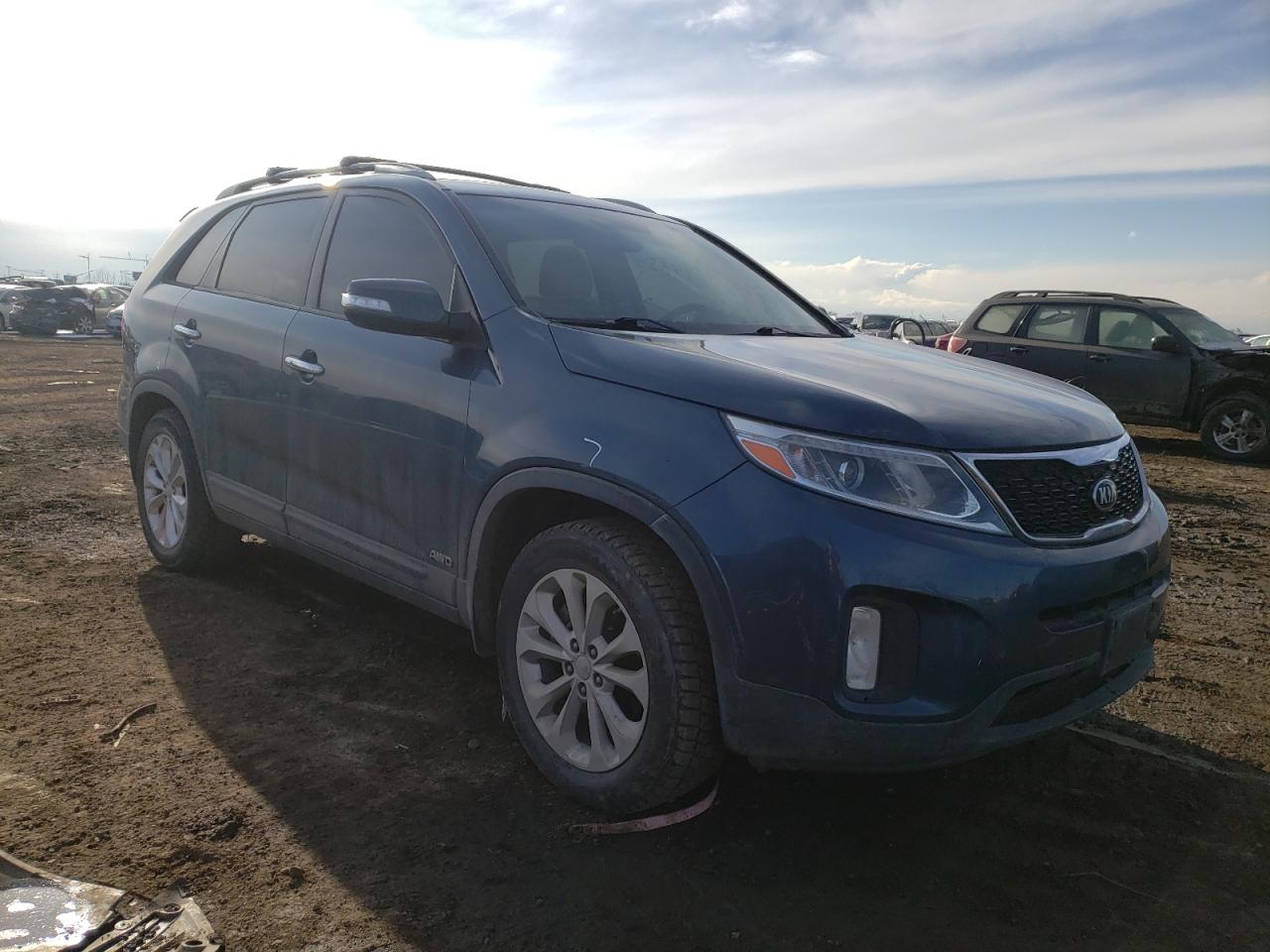 KIA SORENTO EX 2015 with VIN 5XYKUDA73FG609599 - Photo from auction