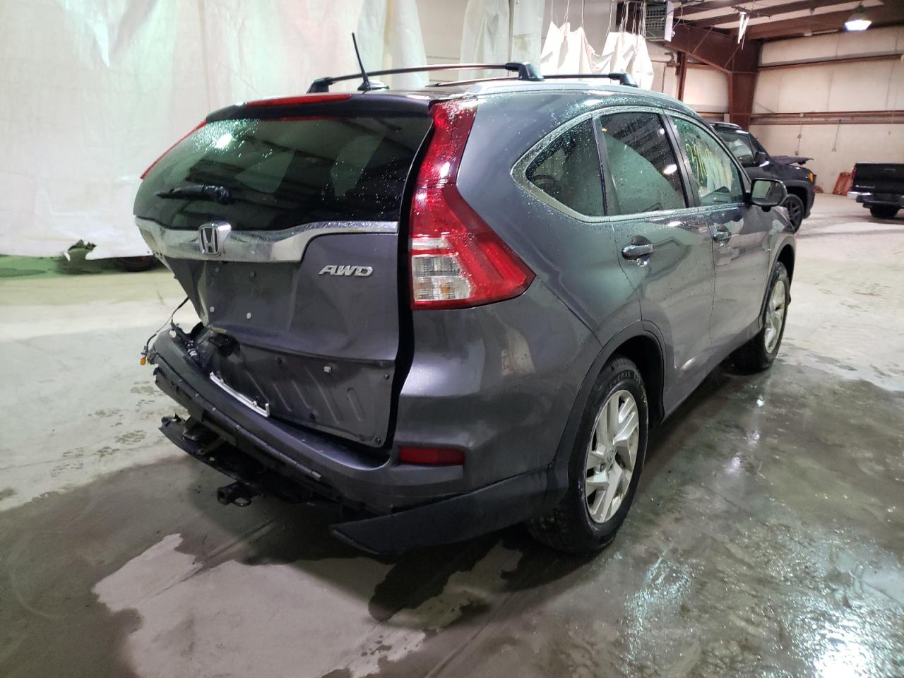 Photo 4 from auction – 2016 HONDA CR-V EXL with VIN 5J6RM4H79GL121942
