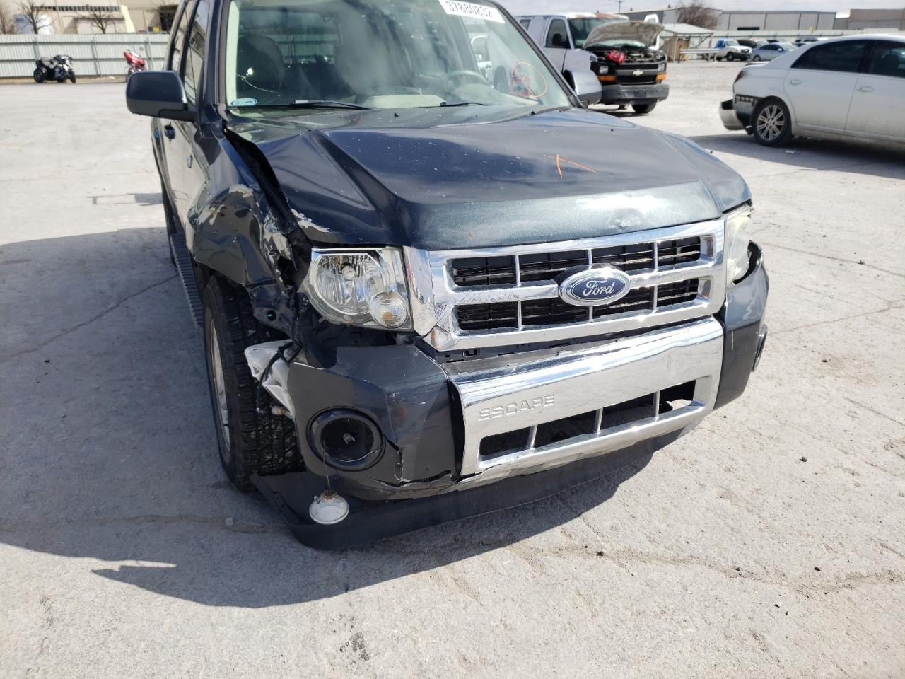 Photo 9 from auction – 2008 FORD ESCAPE HEV with VIN 1FMCU59H98KA20038