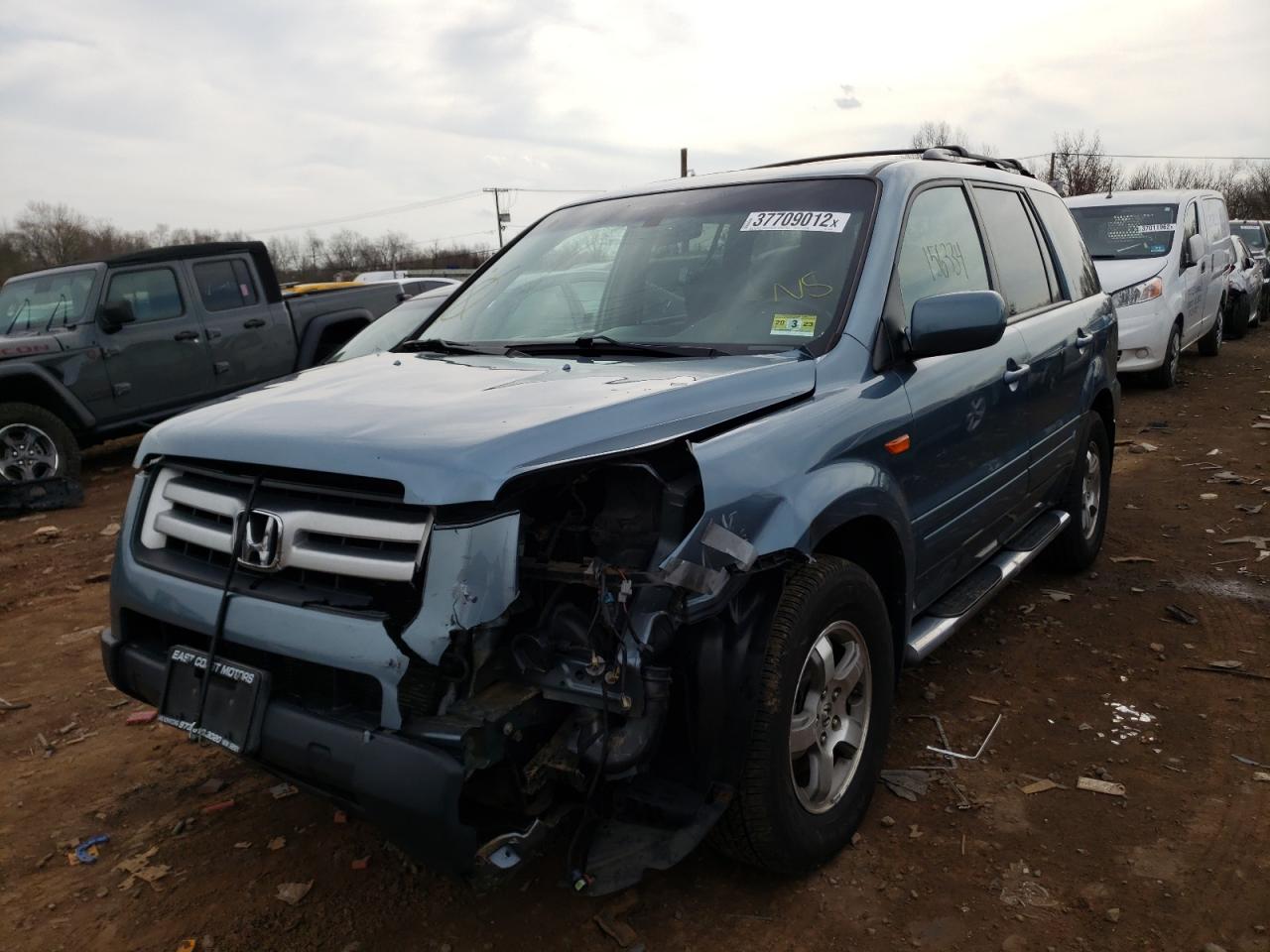 Photo 2 from auction – 2006 HONDA PILOT EX with VIN 2HKYF18546H553799