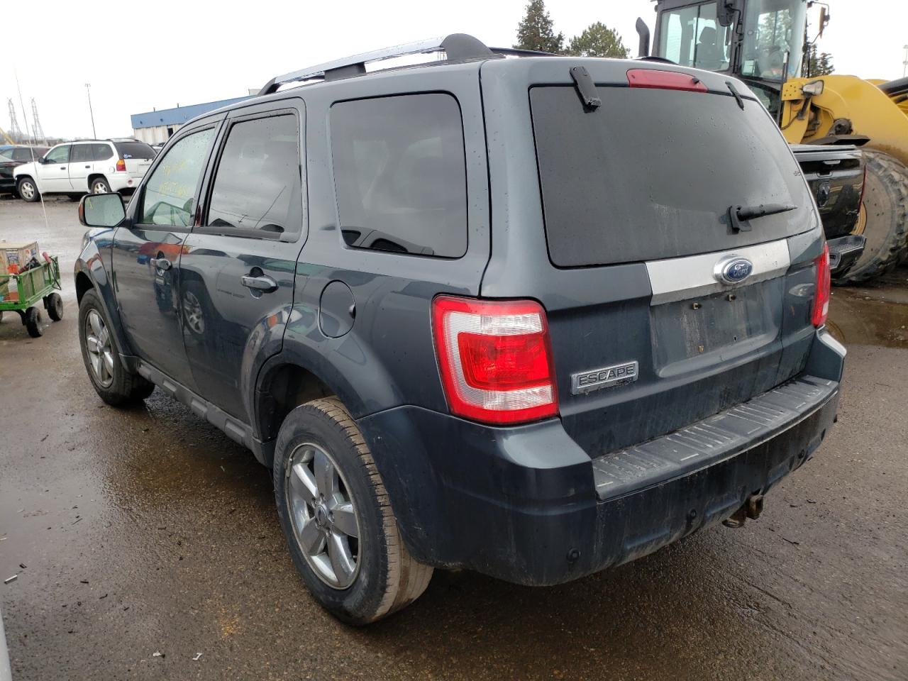 Photo 3 from auction – 2009 FORD ESCAPE LIM with VIN 1FMCU04G99KA63040