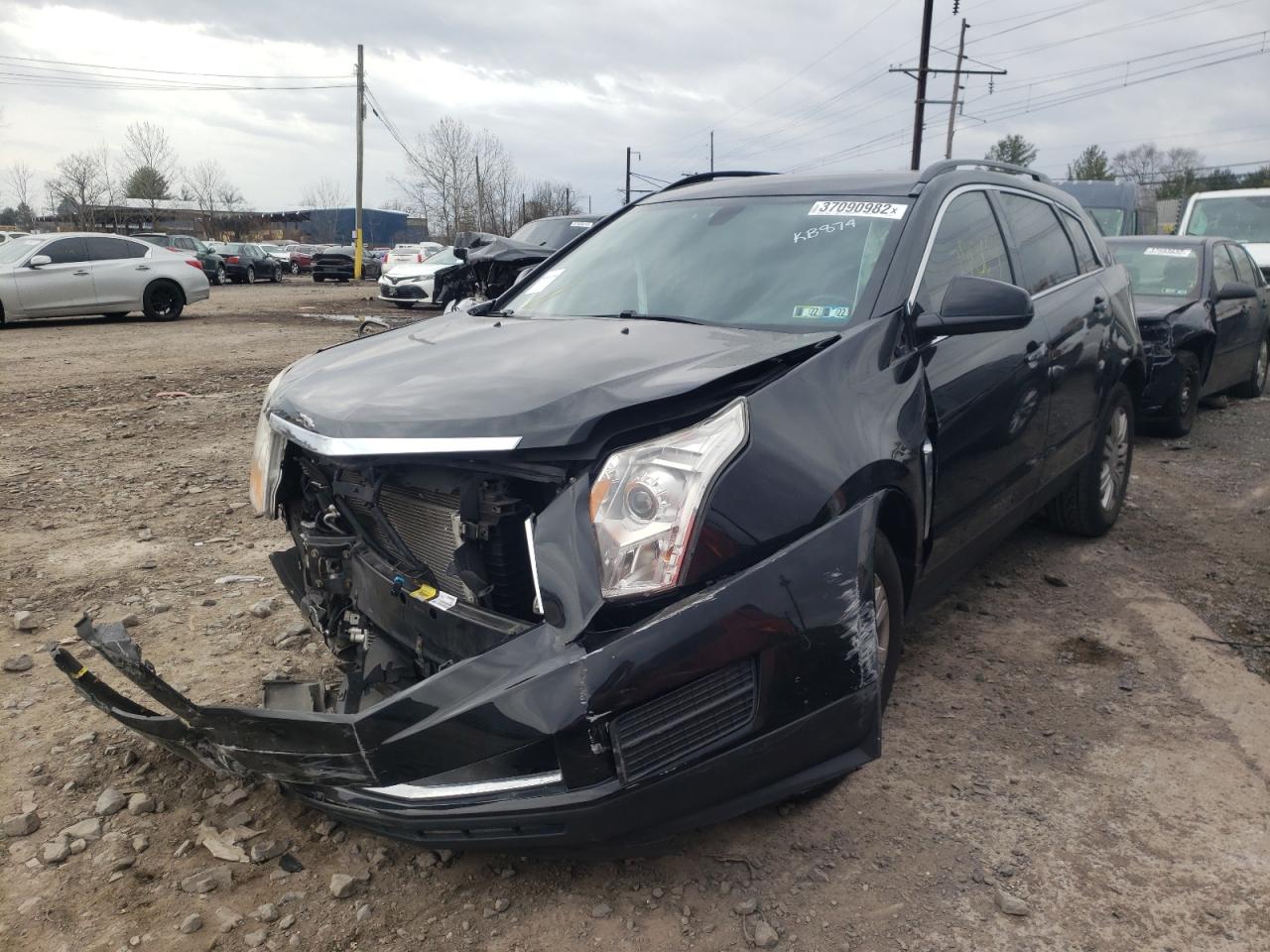 Photo 2 from auction – 2015 CADILLAC SRX with VIN 3GYFNAE33FS560269