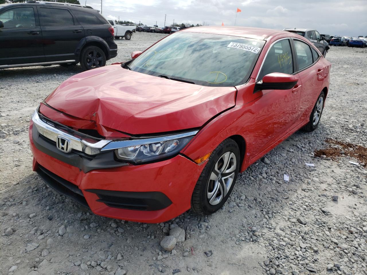 Photo 2 from auction – 2017 HONDA CIVIC LX with VIN 2HGFC2F59HH536972