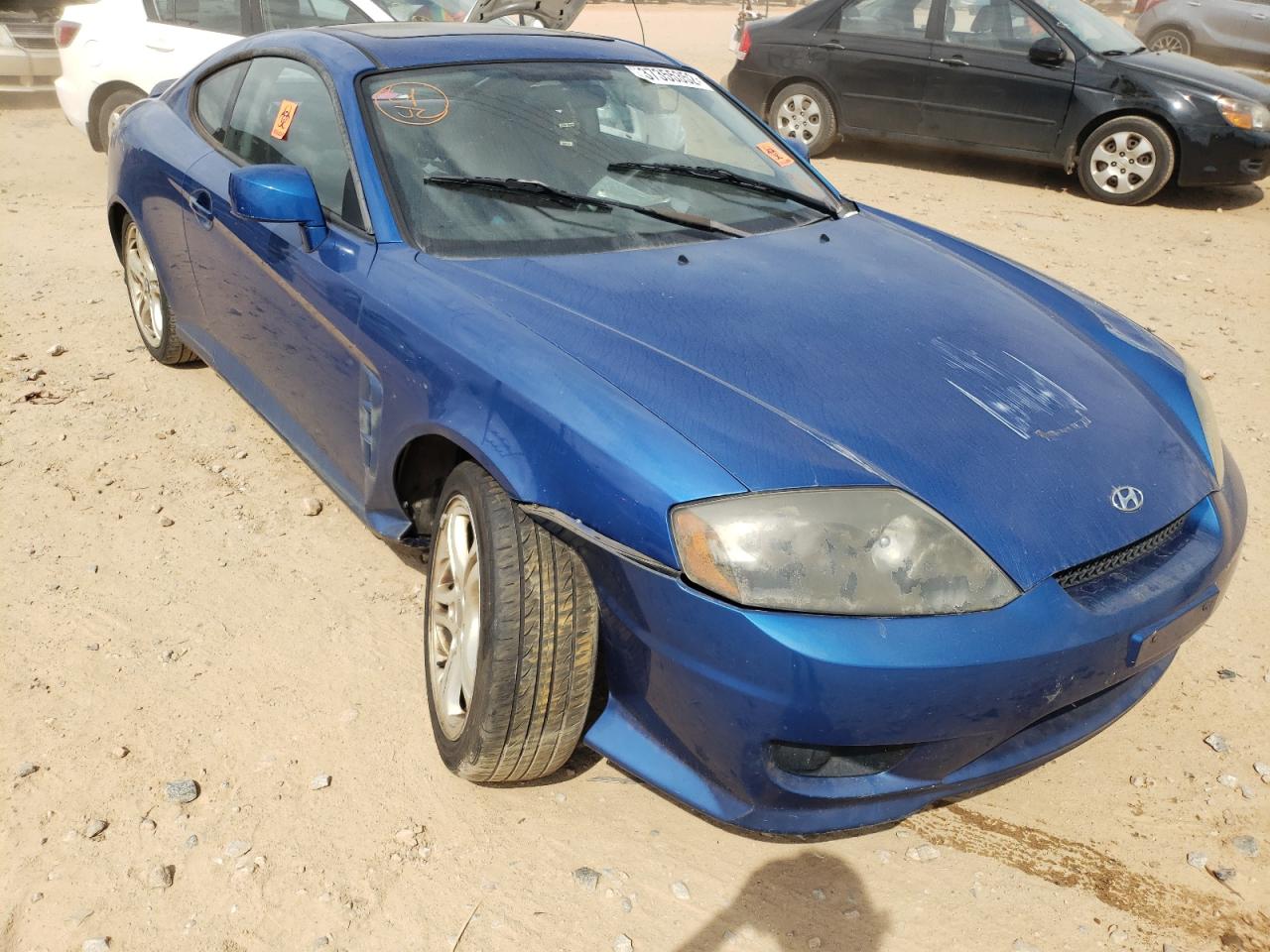 HYUNDAI TIBURON 2005 with VIN KMHHM65D25U169518 - Photo from auction